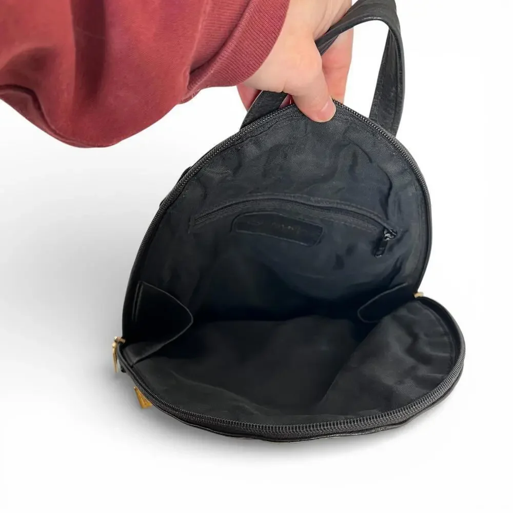 Vintage Tignanello Black Faux Leather Crossbody Backpack with Gold Hardware